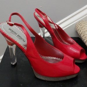 Open-toed red heels